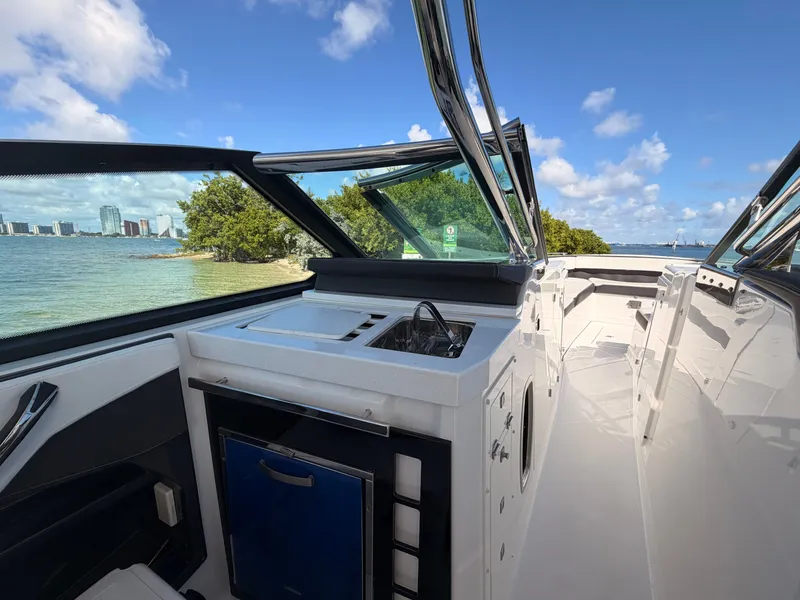 Slide: The Image of 2017 Monterey 378 Super Express boat interior with ocean view and modern amenities. - 13