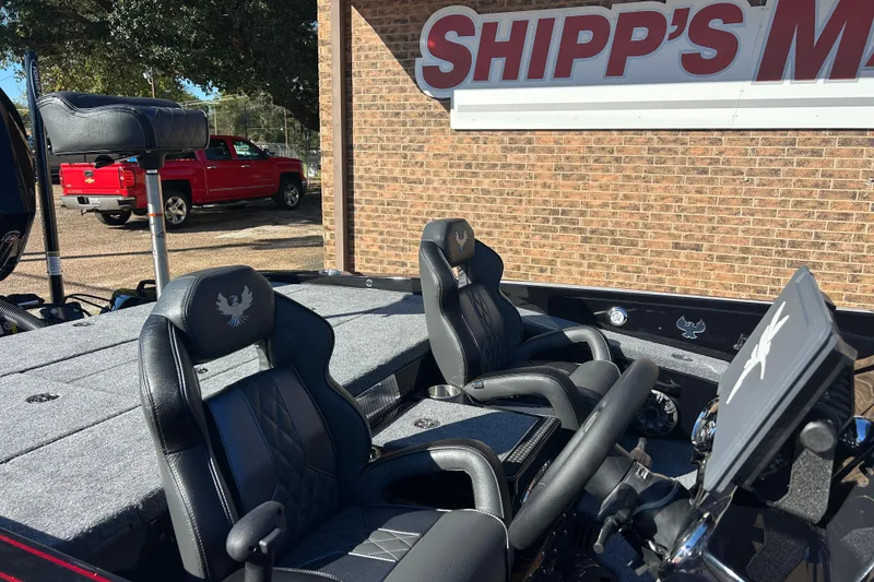 Slide: The Image of 2026 Phoenix 921 Elite X boat interior with black leather seats at Shipp's Marine. - 4