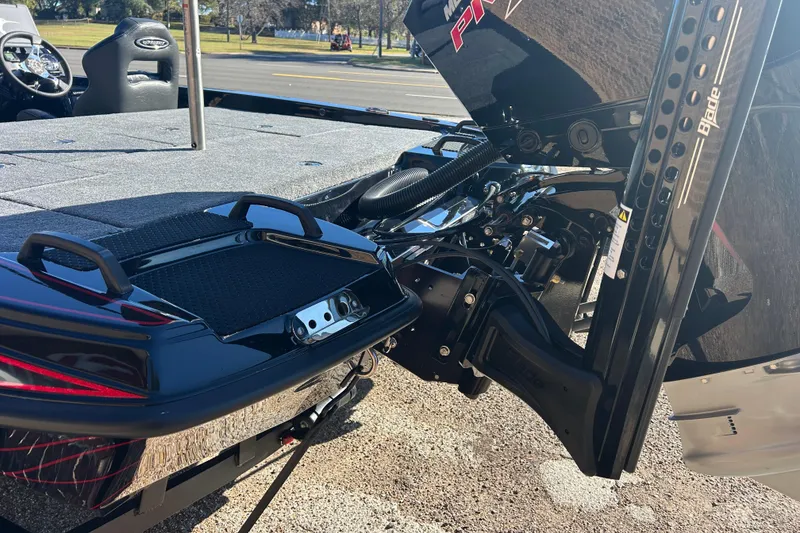 Slide: The Image of 2026 Phoenix 921 Elite X boat with advanced motor and sleek design features. - 8