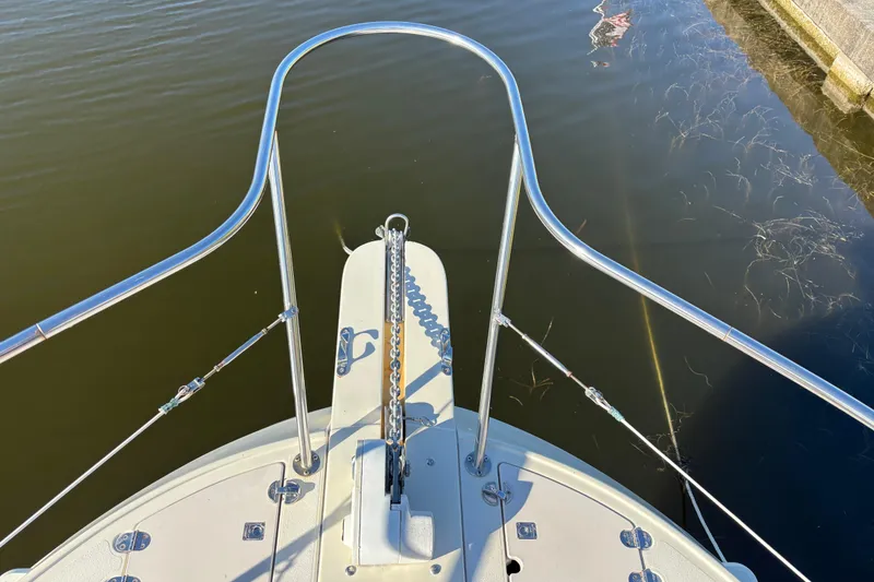 Slide: The Image of Bow view of 2001 Albin 28 Tournament Express boat with stainless steel railings. - 9