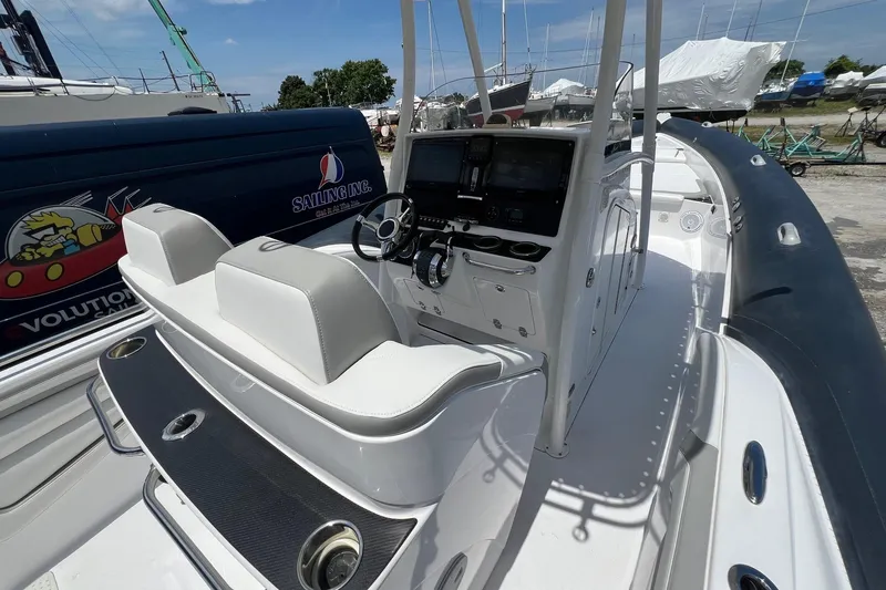 Slide: The Image of 2015 Airship 330 boat interior with modern dashboard and seating. - 4