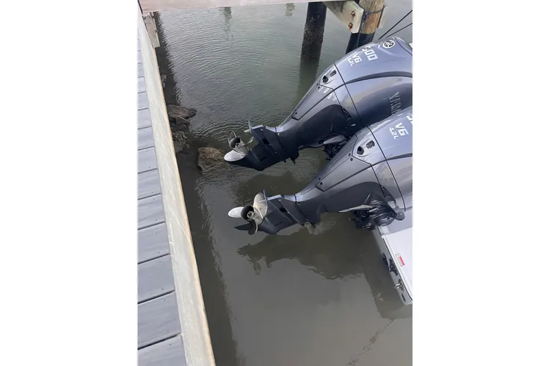 Slide: The Image of Twin Yamaha outboard motors on a 2021 Sea Hunt Gamefish 30 Coffin Box boat. - 12