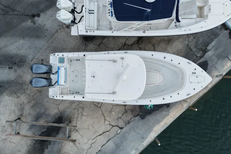Slide: The Image of Overhead view of 2021 Sea Hunt Gamefish 30 Coffin Box boat docked. - 20