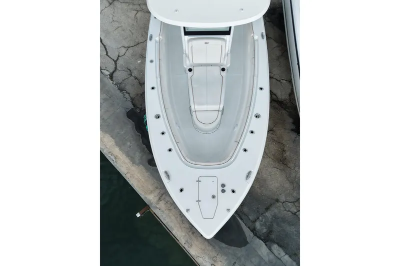Slide: The Image of Overhead view of 2021 Sea Hunt Gamefish 30 Coffin Box boat docked. - 25