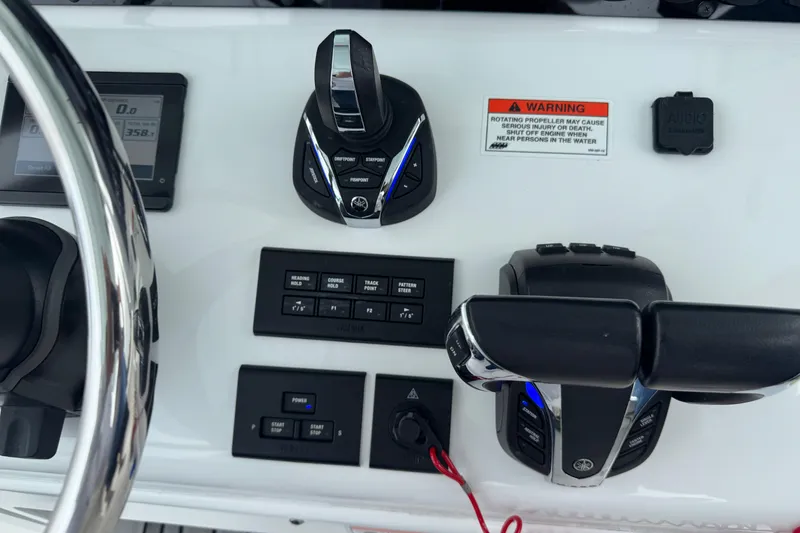 Slide: The Image of 2021 Sea Hunt Gamefish 30 Coffin Box boat controls and dashboard close-up. - 31