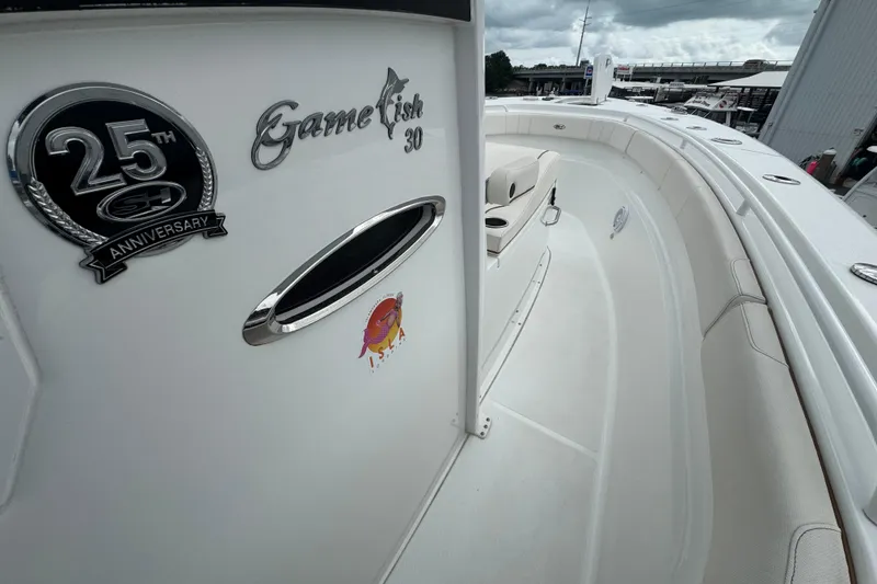 Slide: The Image of 2021 Sea Hunt Gamefish 30 Coffin Box boat interior with 25th anniversary emblem. - 40