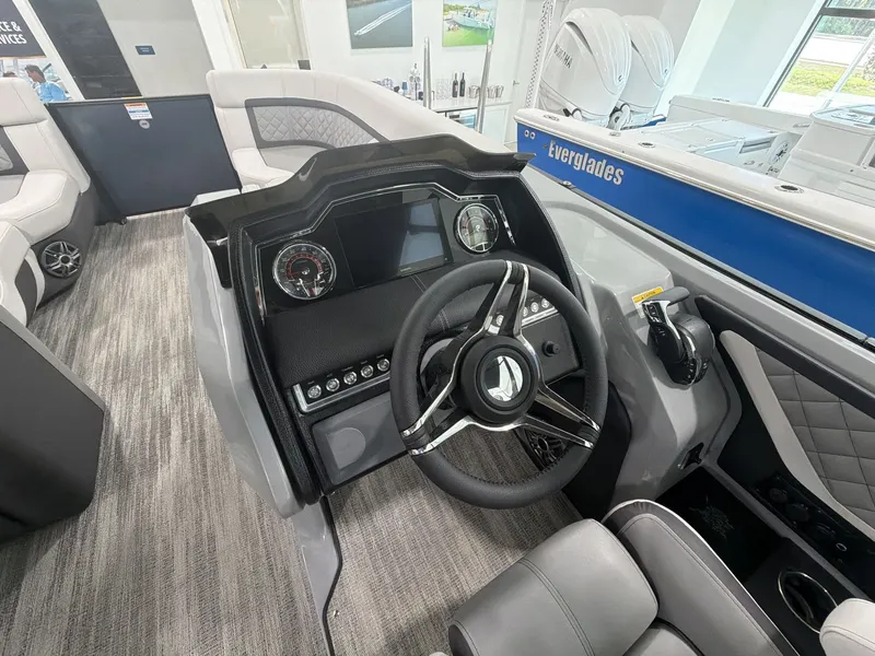 Slide: The Image of Interior view of Godfrey 255 SFL 2026 boat cockpit. - 18