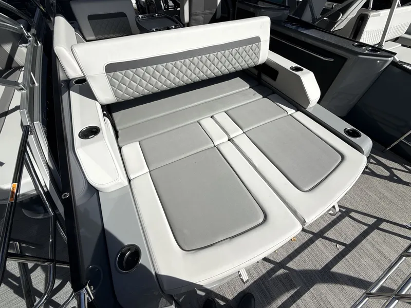 Slide: The Image of 2026 Godfrey 255 SFL pontoon boat in a showroom. - 4