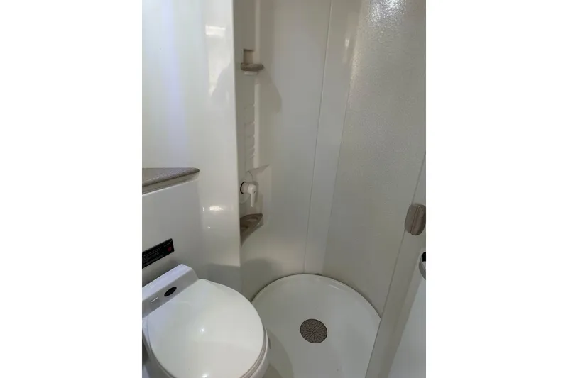 Slide: The Image of 1997 Formula 41 Performance Cruiser bathroom with shower and toilet. - 17