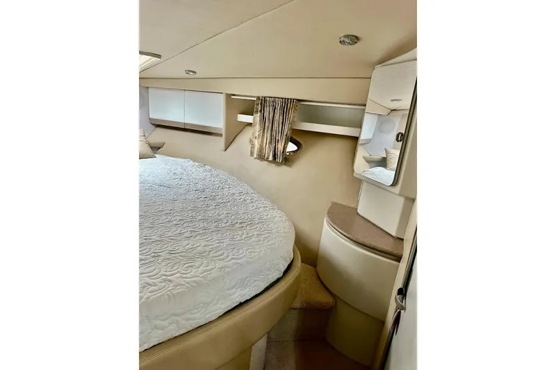 Slide: The Image of 1997 Formula 41 Performance Cruiser cabin interior with bed and mirror. - 19