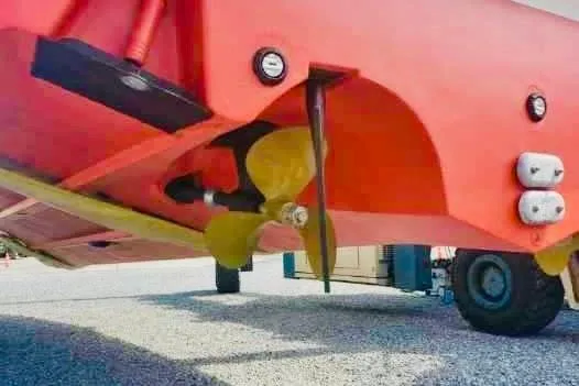 Slide: The Image of 1997 Formula 41 Performance Cruiser propeller and hull on a trailer. - 28