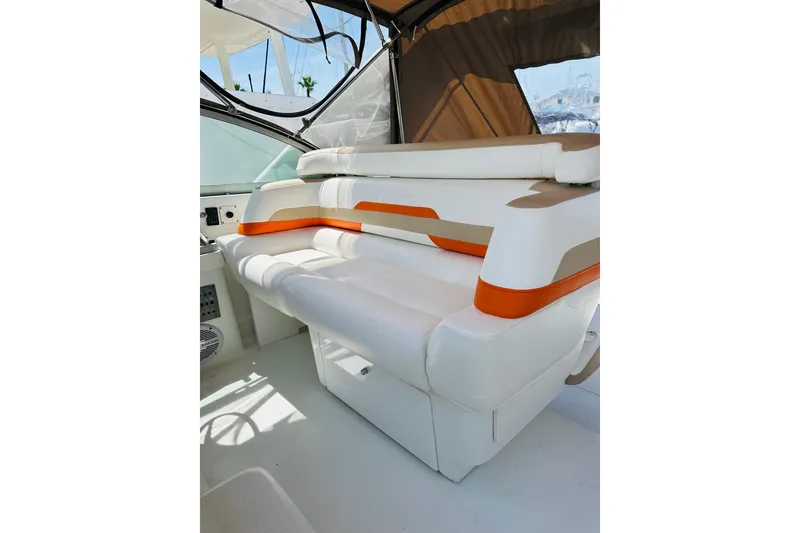 Slide: The Image of 1997 Formula 41 Performance Cruiser interior with white and orange seating. - 4