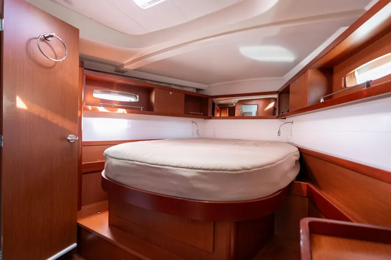 Slide: The Image of Luxurious cabin interior of 2013 Beneteau Oceanis 50 yacht with wooden finish. - 14