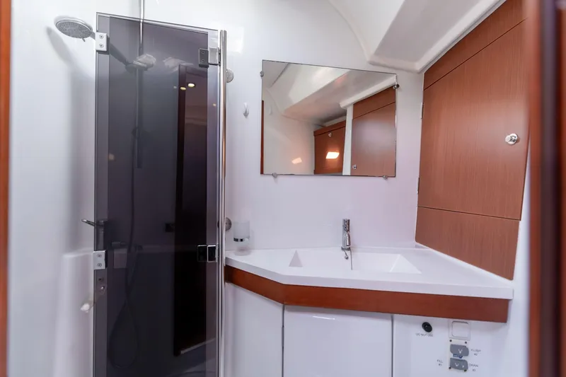 Slide: The Image of Modern bathroom in 2013 Beneteau Oceanis 50 yacht with shower and sink. - 17