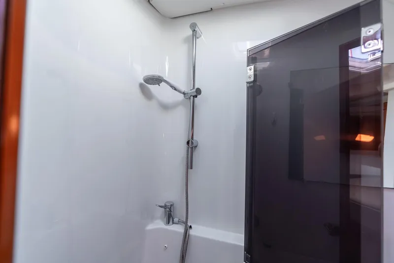 Slide: The Image of Shower area in 2013 Beneteau Oceanis 50 yacht, featuring modern fixtures and sleek design. - 18