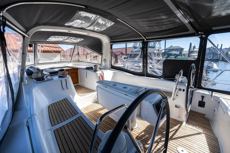 Slide: The Image of Interior view of 2013 Beneteau Oceanis 50 yacht cockpit with wooden flooring. - 4