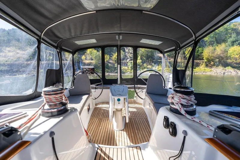 Slide: The Image of Interior view of 2013 Beneteau Oceanis 50 sailboat cockpit with dual steering wheels. - 41