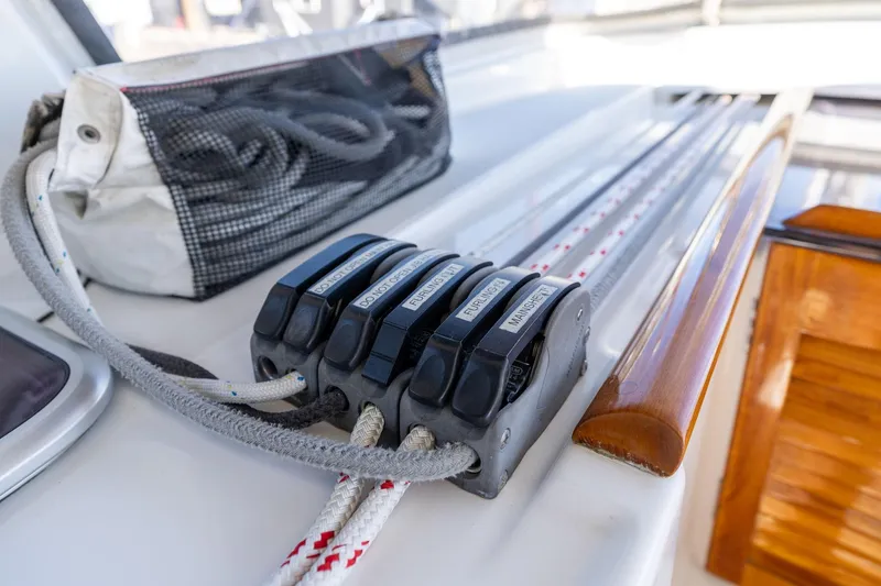 Slide: The Image of Close-up of Beneteau Oceanis 50 sailboat rigging and control lines, 2013 model. - 56