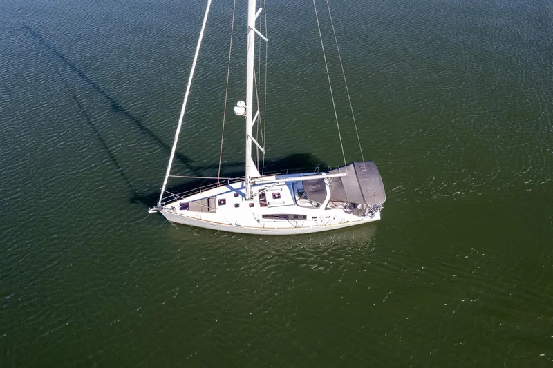 Slide: The Image of Aerial view of 2013 Beneteau Oceanis 50 sailboat on calm water. - 70