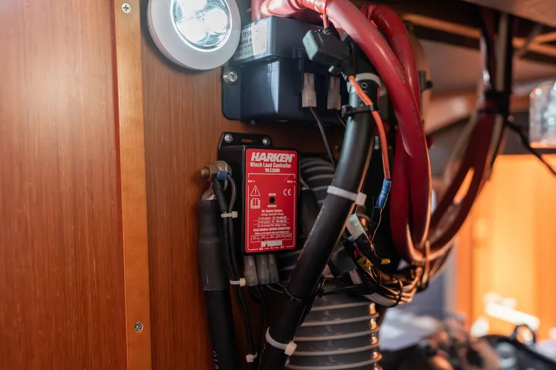 Slide: The Image of Electrical components inside a 2013 Beneteau Oceanis 50 yacht, featuring Harken winch load controller. - 78