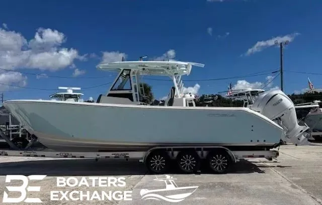 The Image of 2026 Cobia 305 Center Console boat on trailer at Boaters Exchange. - 1