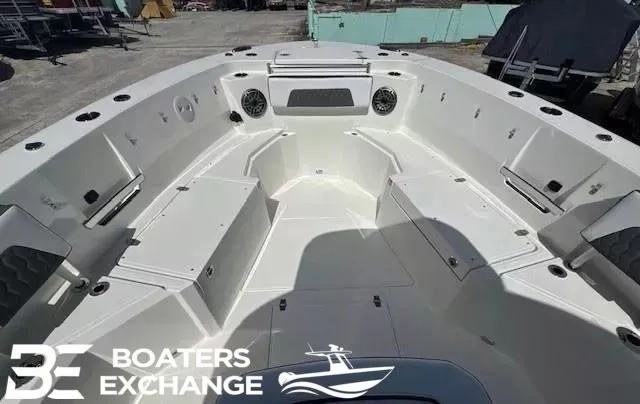 Slide: The Image of Cobia 305 Center Console 2026 with spacious deck and seating. - 10