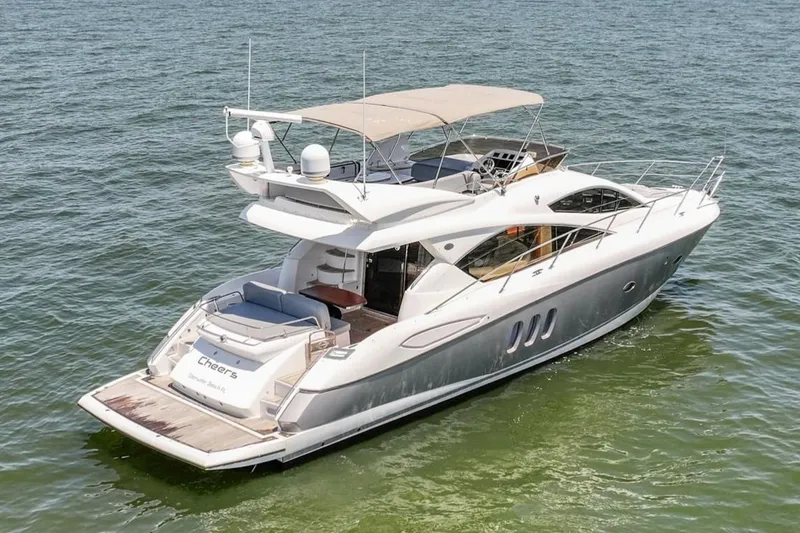 The Image of 2009 Sunseeker Manhattan 52 yacht cruising on open water. - 0