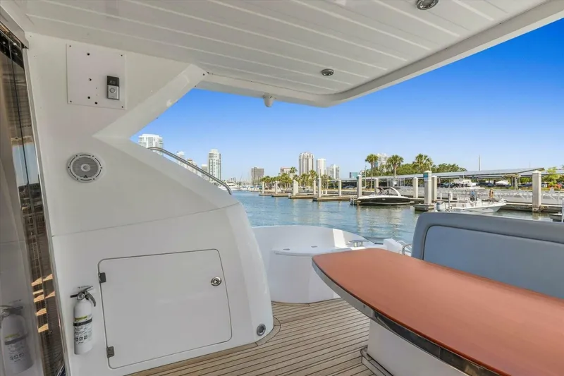 Slide: The Image of Sunseeker Manhattan 52 yacht deck with waterfront view, 2009 model. - 20