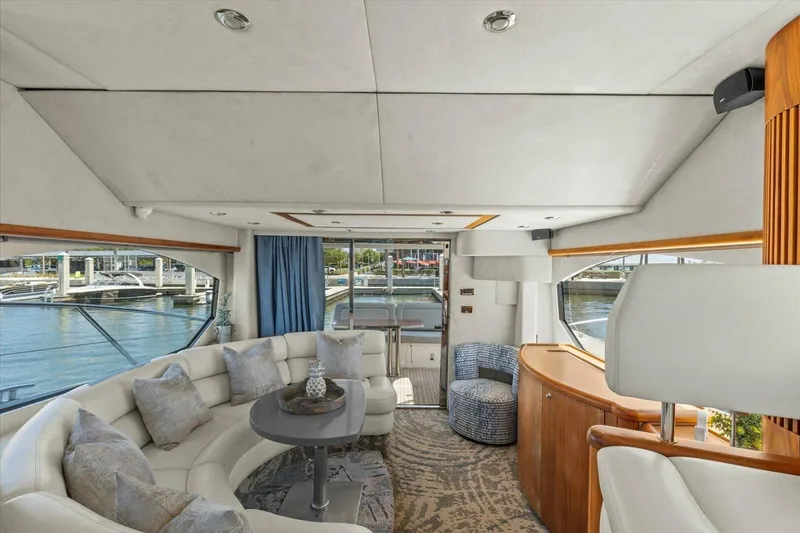 Slide: The Image of Luxurious interior of 2009 Sunseeker Manhattan 52 yacht with elegant seating and waterfront view. - 22