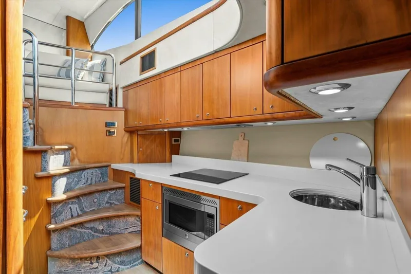 Slide: The Image of Luxurious bedroom interior of 2009 Sunseeker Manhattan 52 yacht with elegant wood finishes. - 29