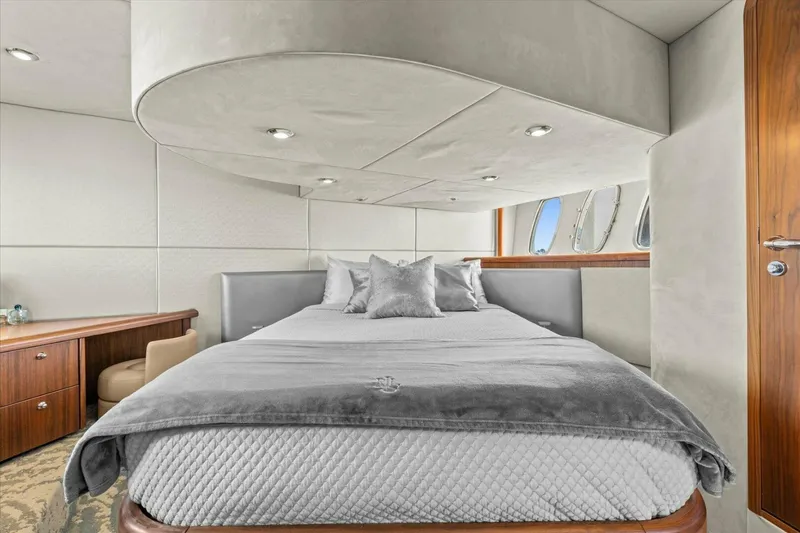 Slide: The Image of Luxurious bedroom interior of 2009 Sunseeker Manhattan 52 yacht with modern decor and TV. - 31