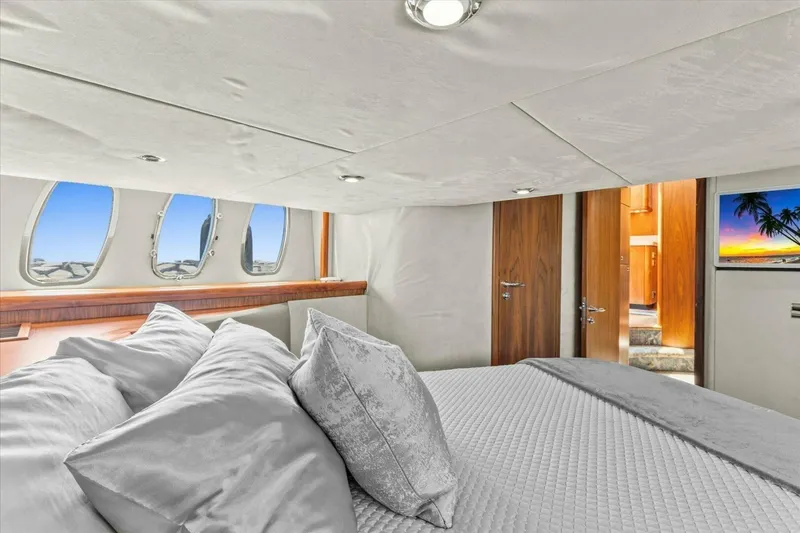 Slide: The Image of Luxurious cabin interior of 2009 Sunseeker Manhattan 52 yacht with elegant wood finish. - 33