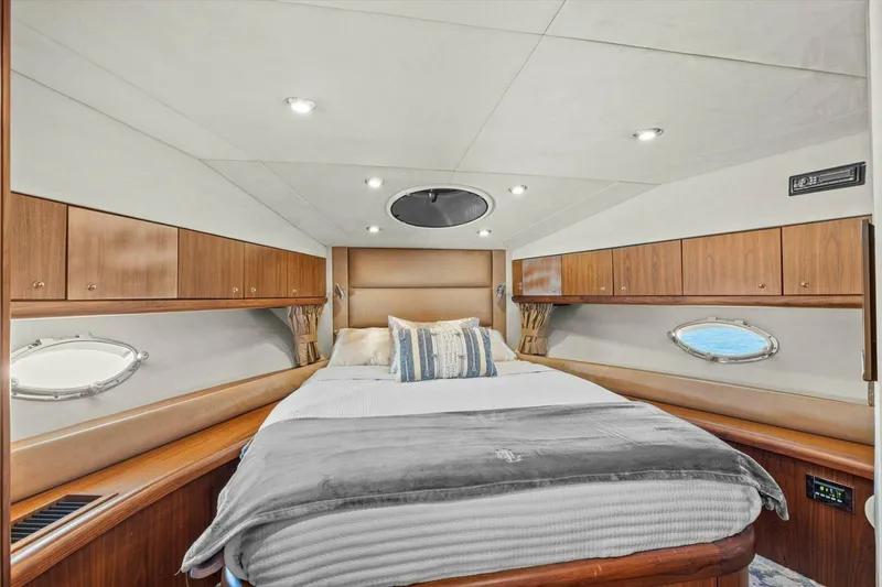 Slide: The Image of Luxurious interior of 2009 Sunseeker Manhattan 52 yacht with elegant bedroom and scenic window views. - 40