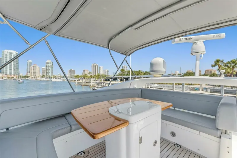 Slide: The Image of 2009 Sunseeker Manhattan 52 yacht deck with sink and seating, ocean view. - 52