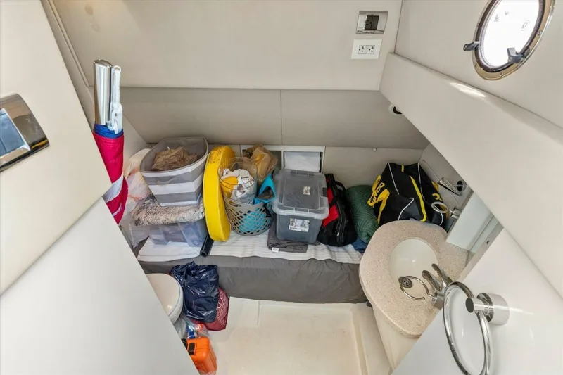 Slide: The Image of Engine room of 2009 Sunseeker Manhattan 52 yacht, featuring complex machinery and equipment. - 57