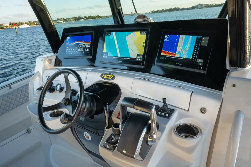 Slide: The Image of Luxurious seating on 2024 HCB 42 Lujo boat, featuring elegant white upholstery. - 30
