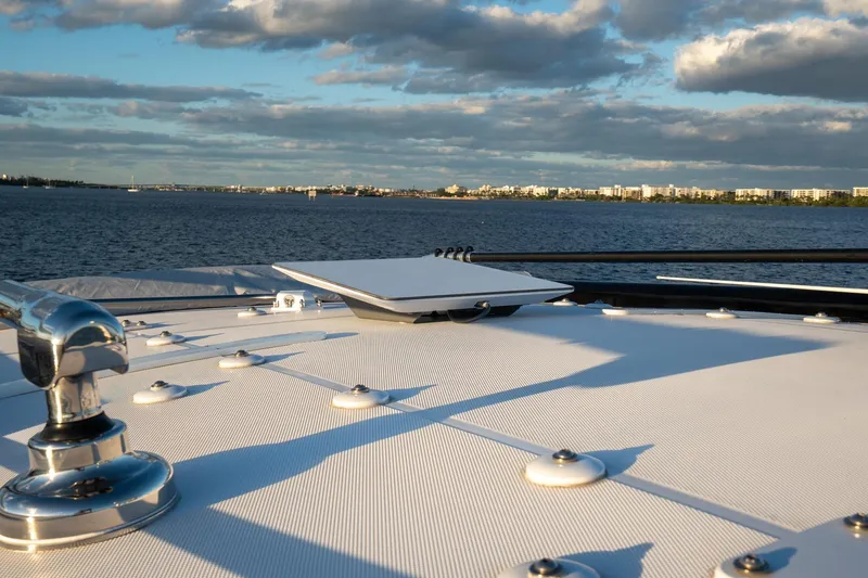 Slide: The Image of 2024 HCB 42 Lujo boat interior with illuminated seating and sleek design. - 35