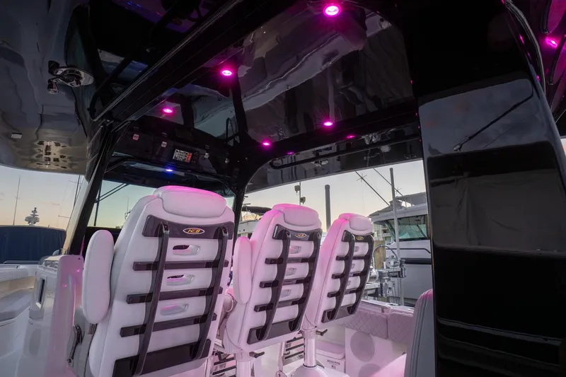 Slide: The Image of Luxurious interior of 2024 HCB 42 Lujo boat with plush white seating. - 40