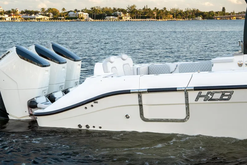 Slide: The Image of 2024 HCB 42 Lujo boat cruising on a calm blue sea. - 5