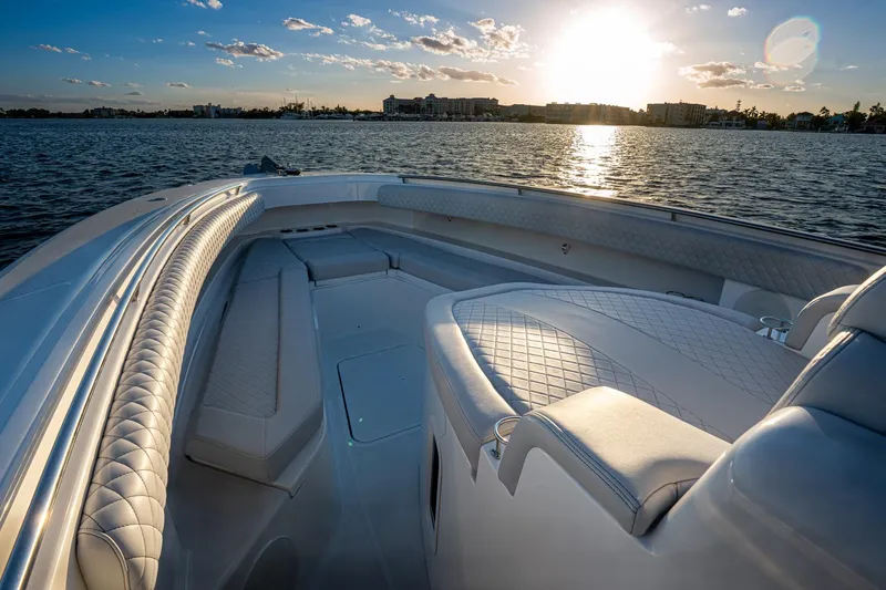 Slide: The Image of 2024 HCB 42 Lujo boat cruising on open water. - 7