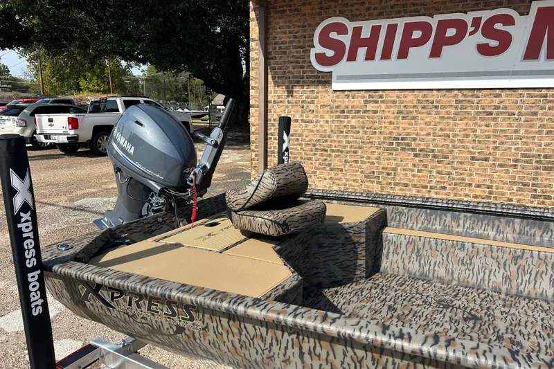 Slide: The Image of 2026 Xpress HD16DBX boat with Yamaha motor at Shipp's Marine, camo design. - 3