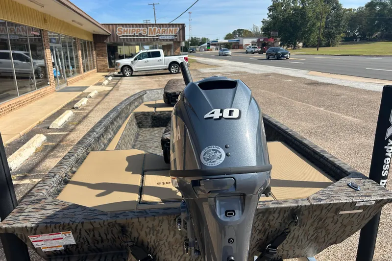 Slide: The Image of 2026 Xpress HD16DBX boat with 40HP engine at Shipps Marine dealership. - 5