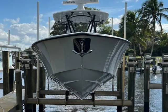 Slide: The Image of 2023 Contender 32 ST boat interior with dual seats and Mercury engines. - 6