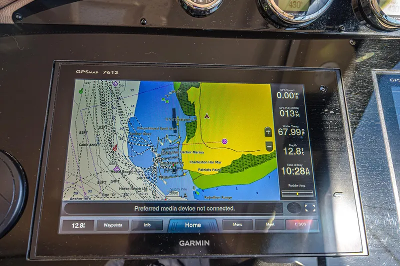 Slide: The Image of Garmin GPS display on 2016 Regal 46 Sport Coupe showing nautical map and navigation data. - 19