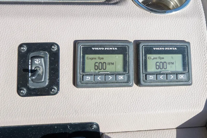 Slide: The Image of Dashboard of 2016 Regal 46 Sport Coupe with Volvo Penta engine RPM displays. - 21