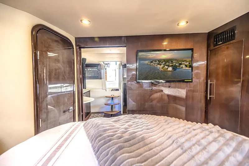 Slide: The Image of Luxurious interior of 2016 Regal 46 Sport Coupe with TV and modern furnishings. - 32