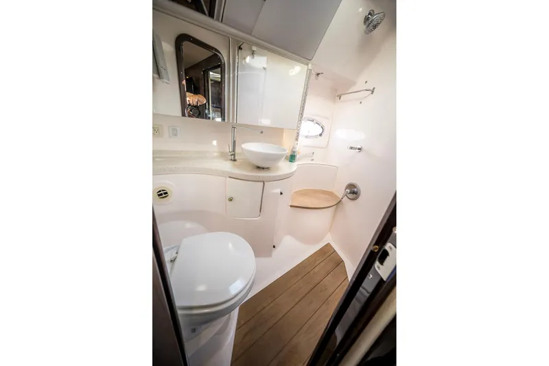 Slide: The Image of Luxurious bathroom in 2016 Regal 46 Sport Coupe yacht with modern fixtures. - 64