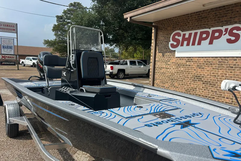 The Image of 2026 Xpress H20B Bay boat at Shipp's Marine dealership, featuring sleek design and modern equipment. - 0
