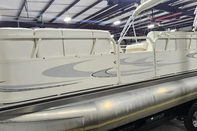 Slide: The Image of 2006 Bentley Pontoons 200/203 Cruise pontoon boat in indoor storage facility. - 5