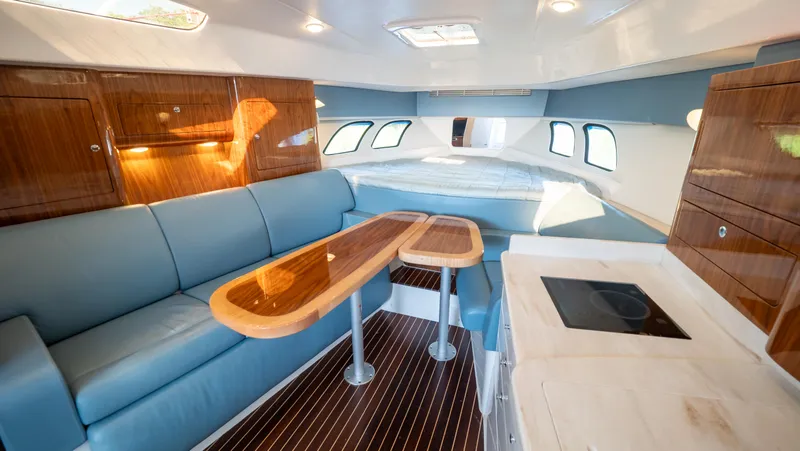 Slide: The Image of Luxurious interior of a 2018 Intrepid 430 Sport Yacht with elegant wood finishes. - 10